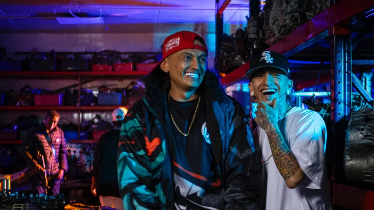 two men smiling at the camera